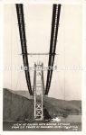 Fotopostkarte Golden Gate Bridge im Bau Foto J.K. Piggott Co. gestempelt 1937